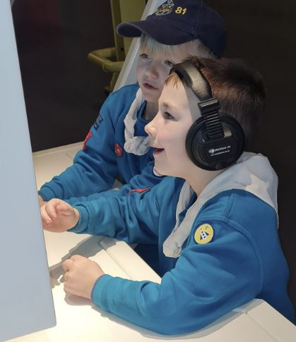 Beaver Scouts interacting at a museum